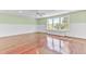 Large bonus room with hardwood floors, natural lighting, and a built in window seat at 1540 Strathmore Ln, Mount Pleasant, SC 29464