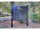 Signage displaying the neighborhood community amenities including tennis, pickleball, and swimming at 1540 Strathmore Ln, Mount Pleasant, SC 29464