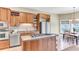 Stylish kitchen with wooden cabinets, a granite countertop island and stainless appliances at 1540 Strathmore Ln, Mount Pleasant, SC 29464