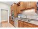 A kitchen features custom wood cabinets and stainless steel appliances at 1540 Strathmore Ln, Mount Pleasant, SC 29464