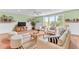 Inviting living room featuring plush seating, hardwood floors, and a large window at 1540 Strathmore Ln, Mount Pleasant, SC 29464