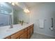 Bathroom featuring double sinks, stylish vanity, and bright lighting at 157 Sea Lavender Ln, Summerville, SC 29486