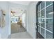 Foyer view showcasing a bright living room with an open floor plan and a view of the outdoors at 157 Sea Lavender Ln, Summerville, SC 29486