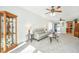Bright and airy living room featuring stylish display cabinet, modern lighting, and comfortable furniture at 157 Sea Lavender Ln, Summerville, SC 29486