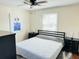 Comfortable bedroom with a cozy bed, chic decor, and lots of natural light at 1610 Larry St, North Charleston, SC 29406