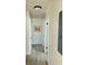 Bright hallway features a neutral color scheme, with light wood flooring and artwork at 1610 Larry St, North Charleston, SC 29406