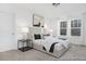 Serene bedroom with a plush bed, side tables, and plenty of natural light at 169 Surf Bird St # 514P, Summerville, SC 29486