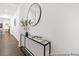 Stylish entryway with a decorative table, mirror, and elegant decor at 169 Surf Bird St # 514P, Summerville, SC 29486