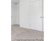 View of hallway with carpet and two white doors at 169 Surf Bird St # 514P, Summerville, SC 29486