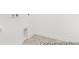 The empty laundry room has tile floor and white walls at 169 Surf Bird St # 514P, Summerville, SC 29486