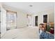 Bedroom featuring carpeted floors, neutral walls, and a large window with plenty of light at 1816 Grimball Rd, Charleston, SC 29412