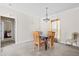 Cozy dining area with a stylish light fixture and comfortable seating for four at 1816 Grimball Rd, Charleston, SC 29412