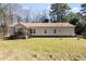 Charming single-story home with a welcoming front porch and well-maintained lawn at 1816 Grimball Rd, Charleston, SC 29412