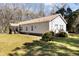 Back view of a single-story home featuring a well-kept lawn and classic design at 1816 Grimball Rd, Charleston, SC 29412