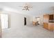 Open-concept living room with access to dining area, featuring neutral walls and carpet at 1816 Grimball Rd, Charleston, SC 29412