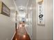 Hallway featuring hardwood floors and a view into the living area at 1818 Towne St, Johns Island, SC 29455