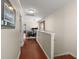 Hallway with hardwood floors leading to office space at 1818 Towne St, Johns Island, SC 29455