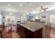 Spacious kitchen with granite countertops, stainless steel appliances and adjacent dining area at 1818 Towne St, Johns Island, SC 29455