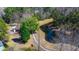 Aerial shot of a pond and walking trails in the community, with a small playground off to the side at 1818 Towne St, Johns Island, SC 29455