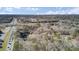 Expansive aerial view of property near a major highway with surrounding woods and trees at 1879 Richmond St, Charleston, SC 29407