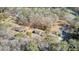 Aerial view of the property with multiple buildings and surrounding trees at 1879 Richmond St, Charleston, SC 29407