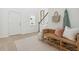 Bright entryway with wooden floors, a charming bench, and stairway at 1039 Swamp Rose Run, Summerville, SC 29485