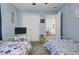 Twin bedroom includes nautical decor, closet, and television for leisure and storage solutions at 200 Short Woods Ct, Summerville, SC 29486