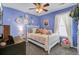 Bright bedroom features plush decor, comfortable furnishings, and ample natural light from the window at 200 Short Woods Ct, Summerville, SC 29486