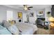 Comfortable main bedroom showcasing inviting decor, a computer workstation, and ample natural light at 200 Short Woods Ct, Summerville, SC 29486