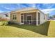 Backyard view of screened in patio at 212 Sweet Cherry Ln, Summerville, SC 29486