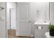 Bright bathroom with a white vanity, toilet, and a decorative plant at 212 Sweet Cherry Ln, Summerville, SC 29486