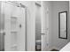 Modern bathroom features enclosed shower with glass door, toilet, and vanity mirror at 212 Sweet Cherry Ln, Summerville, SC 29486