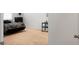 Serene bedroom featuring plush carpet, soft lighting, and a minimalist design at 212 Sweet Cherry Ln, Summerville, SC 29486
