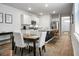 Well-appointed kitchen with stainless steel appliances that flows into a dining room at 212 Sweet Cherry Ln, Summerville, SC 29486