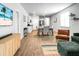 Open-concept living space showcasing a dining area, kitchen, and a comfortable seating arrangement at 212 Sweet Cherry Ln, Summerville, SC 29486