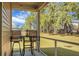 Outdoor porch with table and chairs and backyard views at 212 Sweet Cherry Ln, Summerville, SC 29486