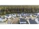 An aerial view of a neighborhood showcasing a variety of home styles at 217 Woodland Oak Way, Summerville, SC 29485