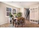 Cozy dining room with many windows and a decorative rug at 217 Woodland Oak Way, Summerville, SC 29485