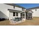 Exterior view showcasing a screened porch and patio area ideal for outdoor gatherings at 217 Woodland Oak Way, Summerville, SC 29485