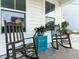 Comfortable front porch with chairs and vibrant decor at 217 Woodland Oak Way, Summerville, SC 29485
