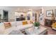 Open-concept living room showcasing modern furniture, decor, and staircase to a second floor at 217 Woodland Oak Way, Summerville, SC 29485
