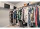 Spacious walk-in closet with shelves and hanging racks for organized storage at 217 Woodland Oak Way, Summerville, SC 29485