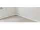 Corner view of a bright and carpeted bedroom with neutral walls at 2254 Macallan Blvd, Ravenel, SC 29470