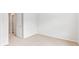 Bright bedroom featuring neutral carpet, freshly painted walls, and doorway at 2254 Macallan Blvd, Ravenel, SC 29470