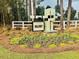 Hillcrest community sign surrounded by landscaping; the sign is illuminated by a solar panel at 2278 Macallan Blvd, Ravenel, SC 29470