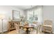 Cozy dining area featuring a round table, natural light, and stylish decor at 2278 Macallan Blvd, Ravenel, SC 29470