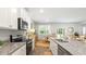 Modern kitchen featuring granite countertops, stainless steel appliances and abundant natural light at 2278 Macallan Blvd, Ravenel, SC 29470