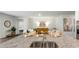 Modern kitchen and open living area featuring granite countertops, stainless steel appliances and hardwood floors at 2278 Macallan Blvd, Ravenel, SC 29470