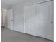 A bedroom with sliding closet doors and white trim offers modern convenience at 231 Hayworth Rd, Summerville, SC 29486