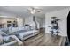 Open-concept living room showcasing a spacious layout, hardwood floors, and natural light, ideal for relaxation and gatherings at 231 Hayworth Rd, Summerville, SC 29486